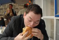 Michelsen enjoying a burger